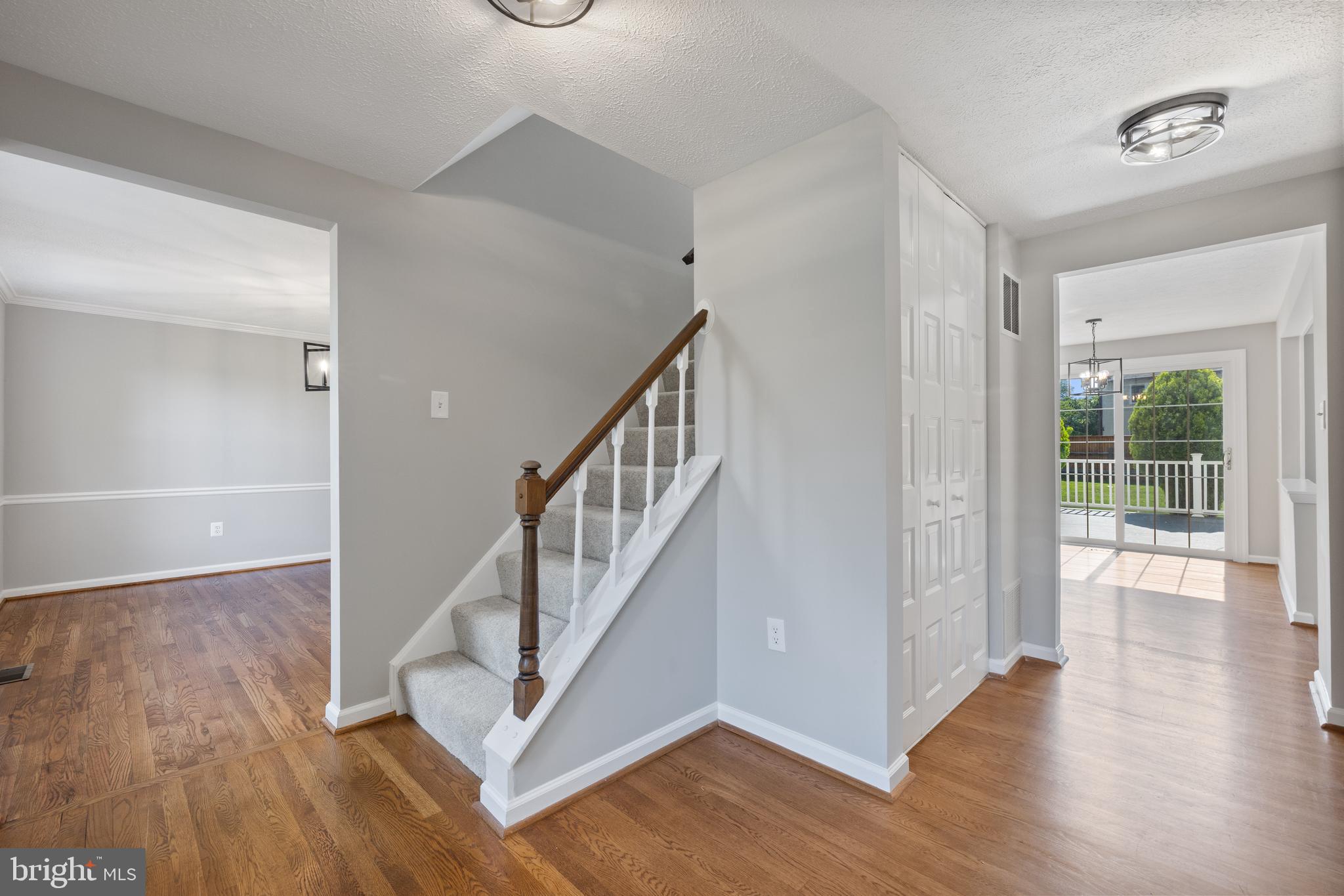 22000 Goshen School Road Gaithersburg, MD 20882 - Photo 10 of 57 a view interior of a house with wooden floor windows and stairs
