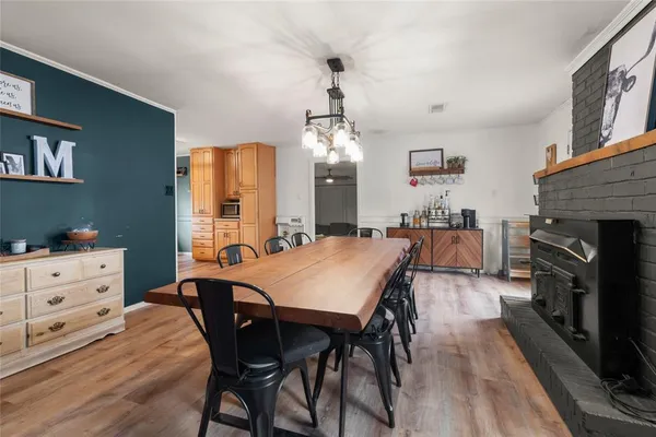 a kitchen with granite countertop cabinets stainless steel appliances and a sink