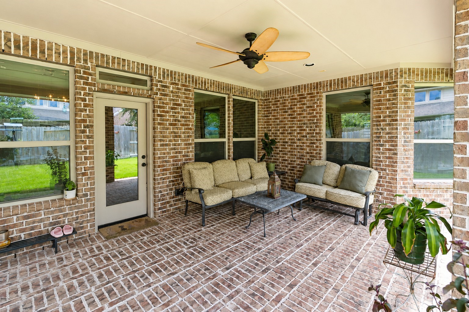 2326 Hamilton Pool Lane Friendswood, TX 77546 - Photo 40 of 49 a balcony with furniture and a potted plant