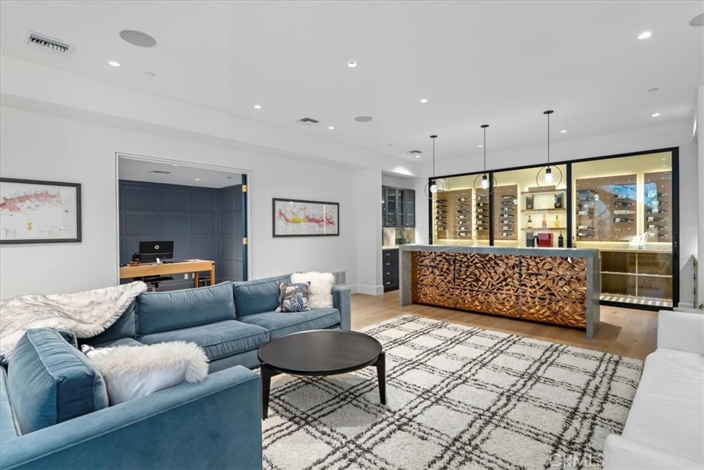 604 14th Street Manhattan Beach, CA 90266 - Photo 34 of 43 a living room with furniture and a rug