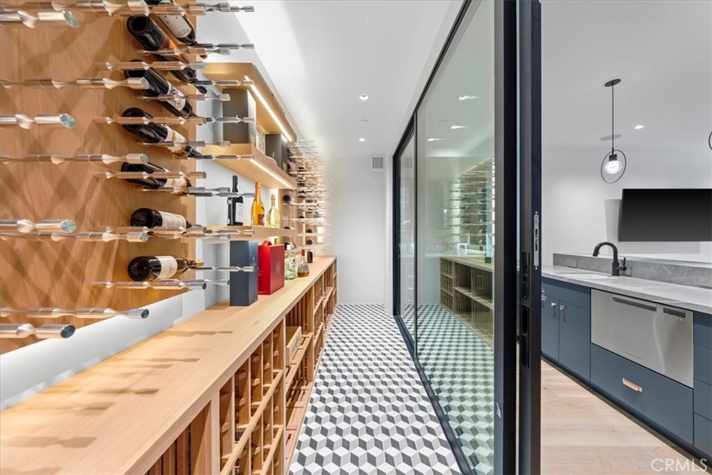 604 14th Street Manhattan Beach, CA 90266 - Photo 35 of 43 a bathroom with a double vanity sink and a mirror