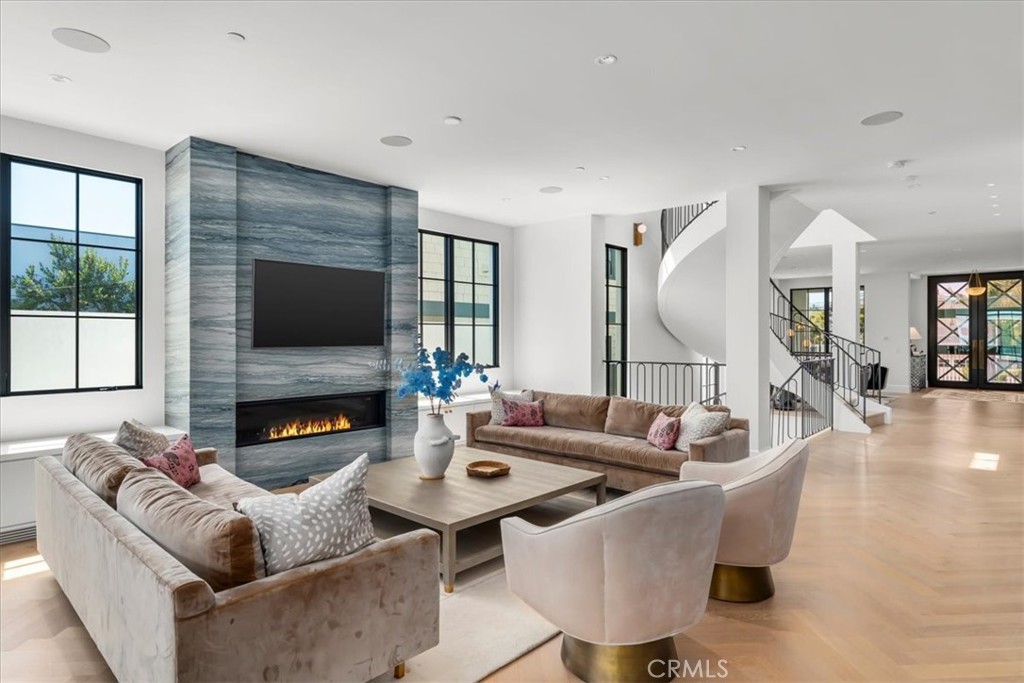 604 14th Street Manhattan Beach, CA 90266 - Photo 8 of 43 a living room with fireplace furniture and a flat screen tv