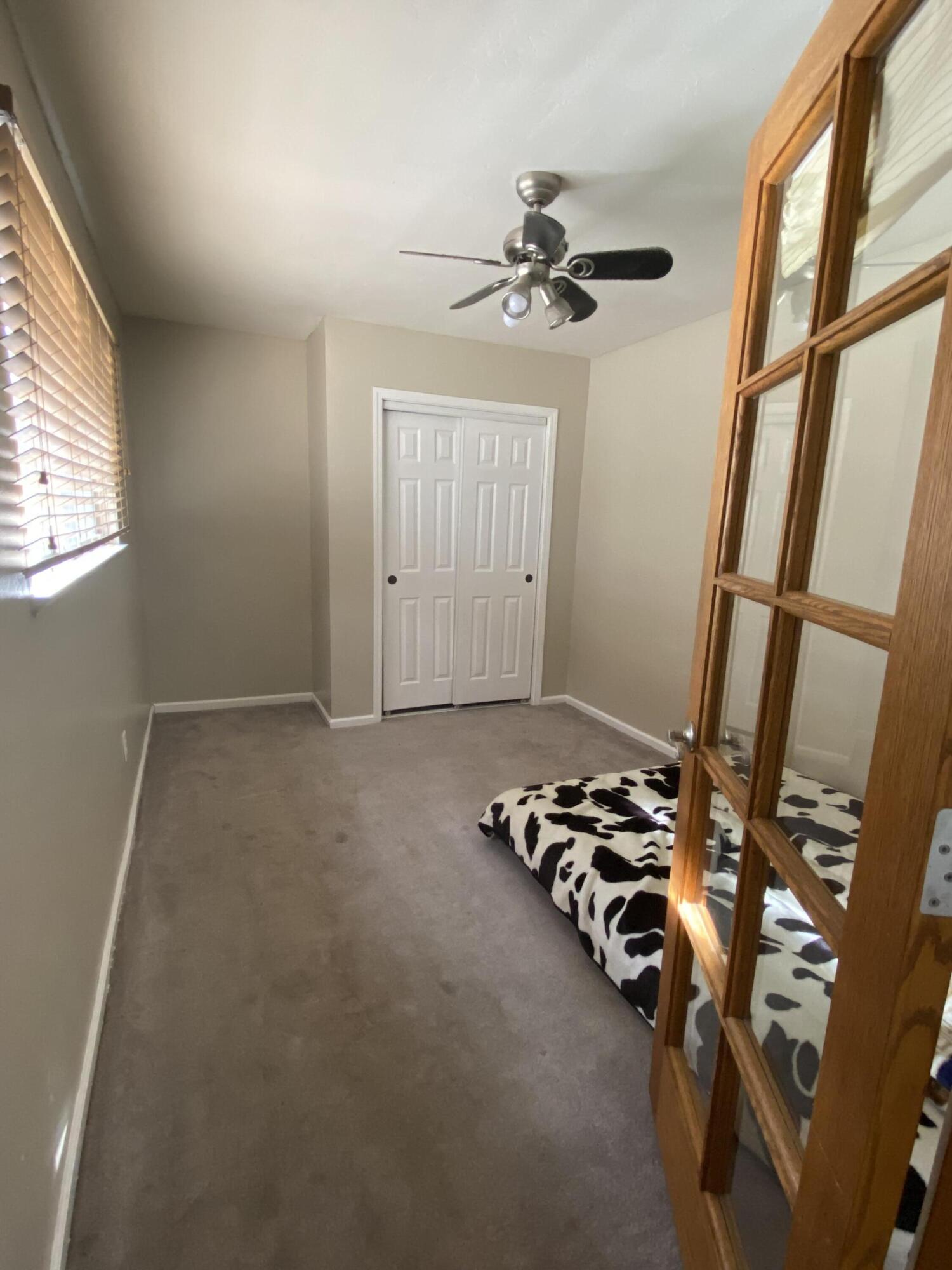 6916 Azalea Avenue Bakersfield, CA 93306 - Photo 15 of 26 a very nice looking room with window and furniture