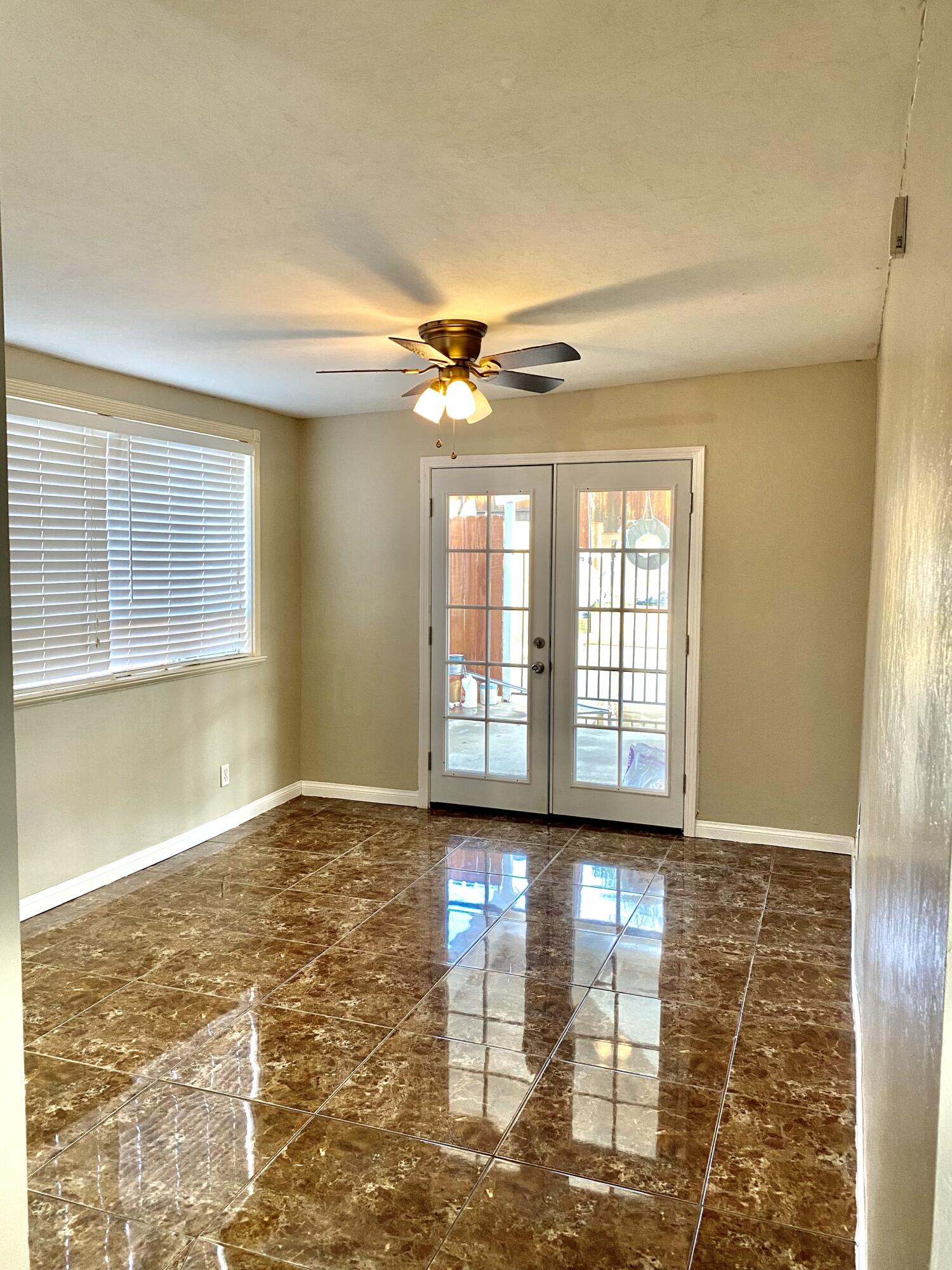 6916 Azalea Avenue Bakersfield, CA 93306 - Photo 6 of 26 a view of an empty room with window