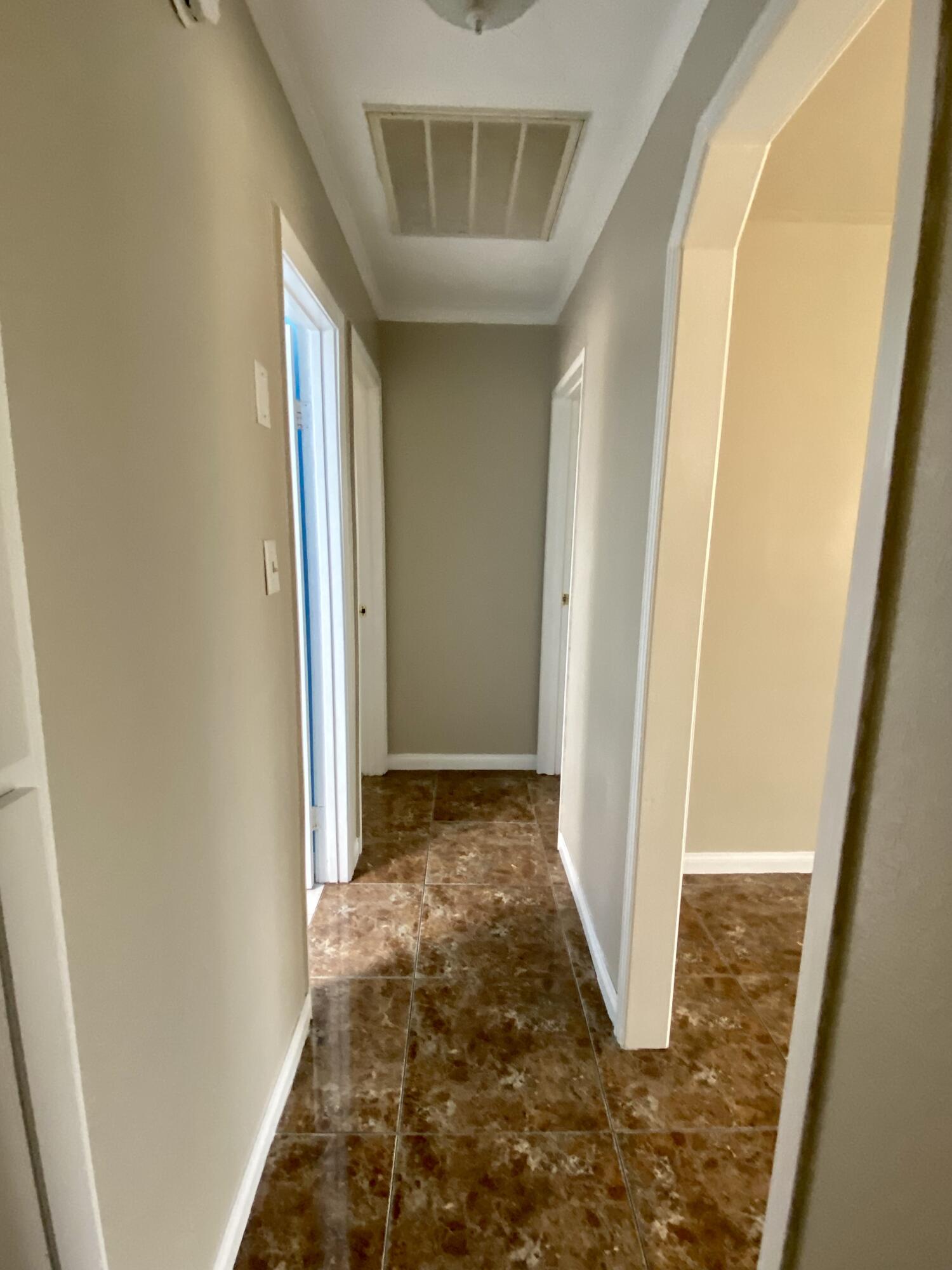 6916 Azalea Avenue Bakersfield, CA 93306 - Photo 8 of 26 a view of hallway with stairs