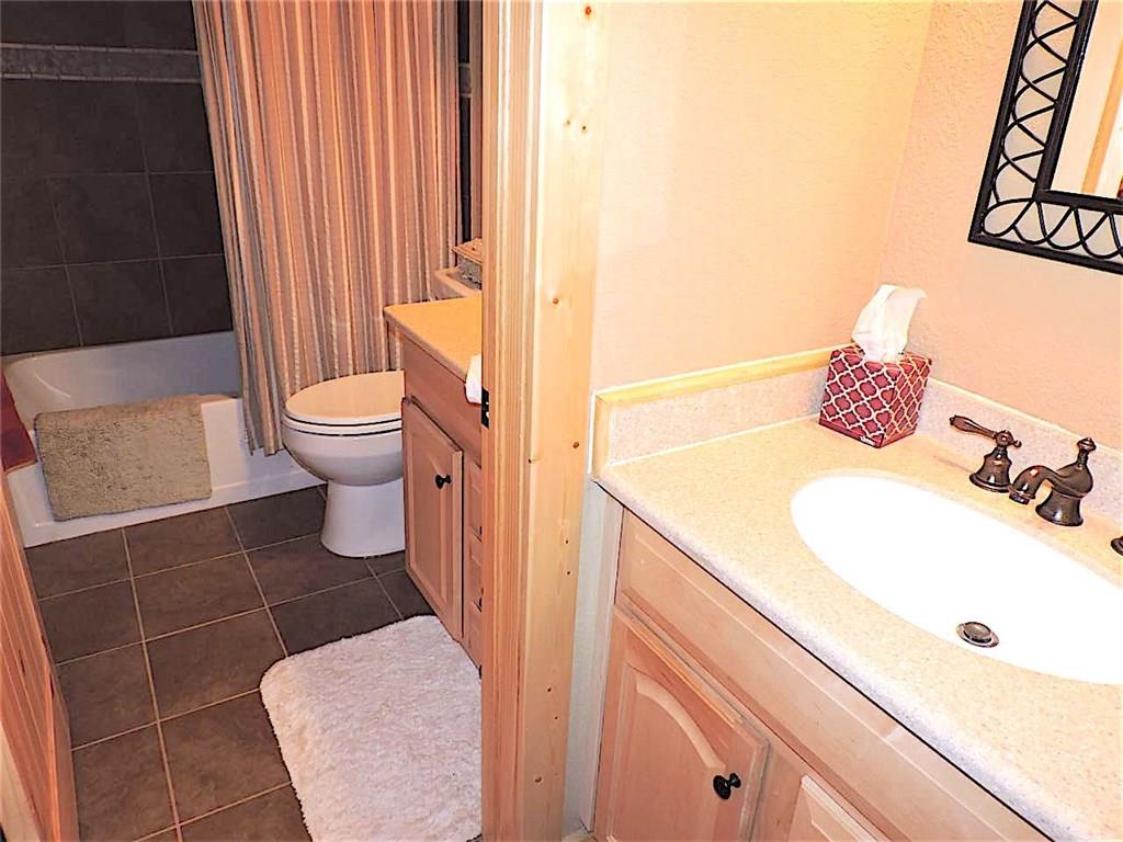 299 Gadwall Road Como, CO 80432 - Photo 20 of 25 a bathroom with a sink and toilet
