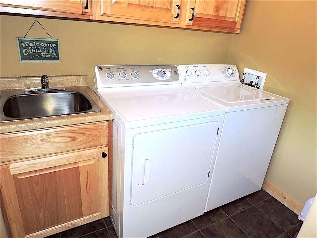 299 Gadwall Road Como, CO 80432 - Photo 21 of 25 a utility room with dryer and washer