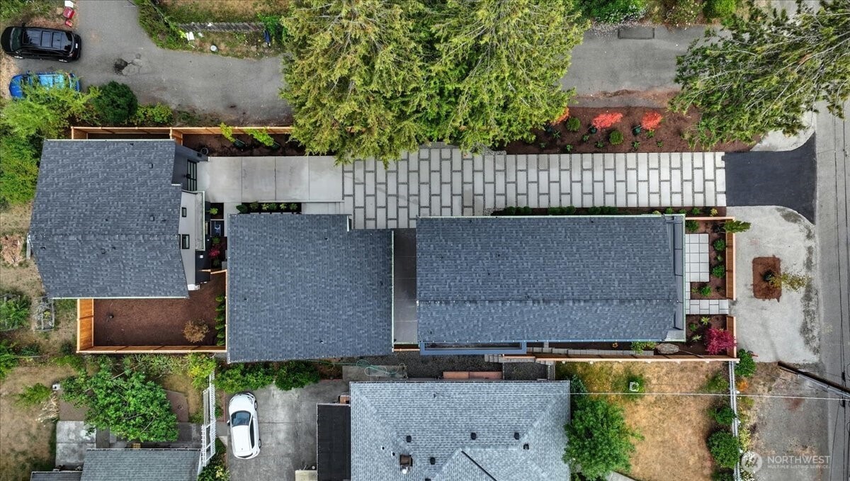 13047 39th Avenue Northeast, Unit B Seattle, WA 98125 - Photo 15 of 16 an aerial view of residential houses with outdoor space