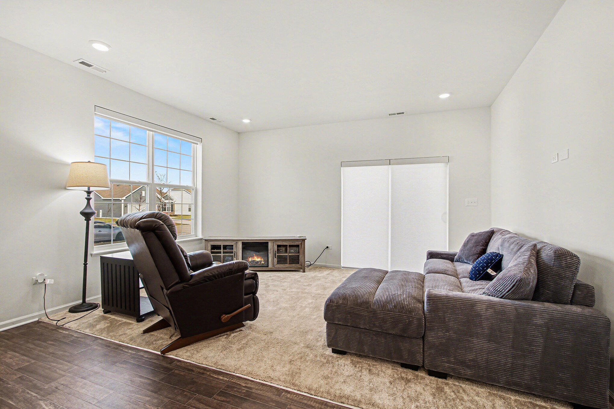 11649 Thomas Street Winfield, IN 46307 - Photo 5 of 15 a living room with furniture a couch and a window