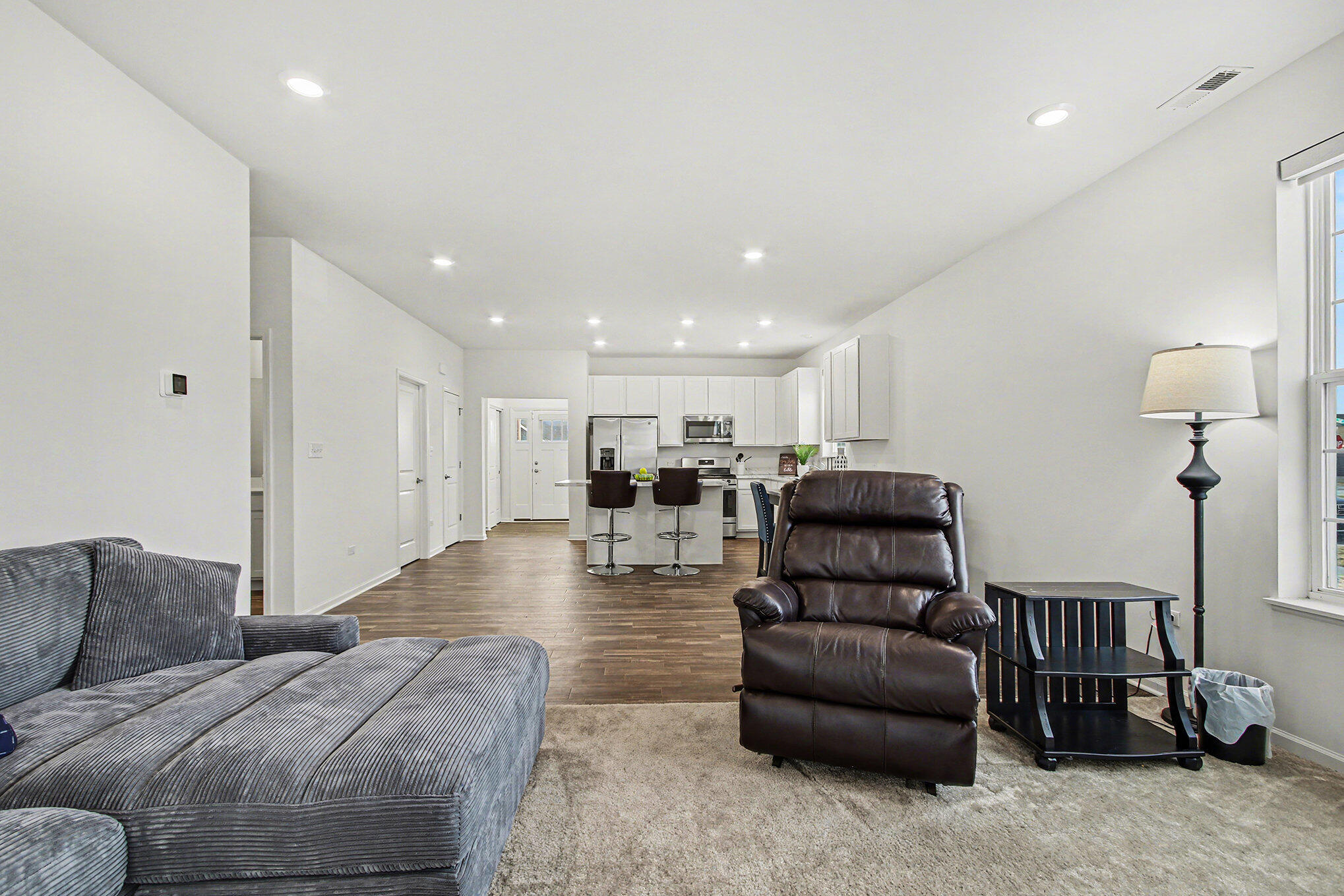 11649 Thomas Street Winfield, IN 46307 - Photo 7 of 15 a living room with furniture and a wooden floor