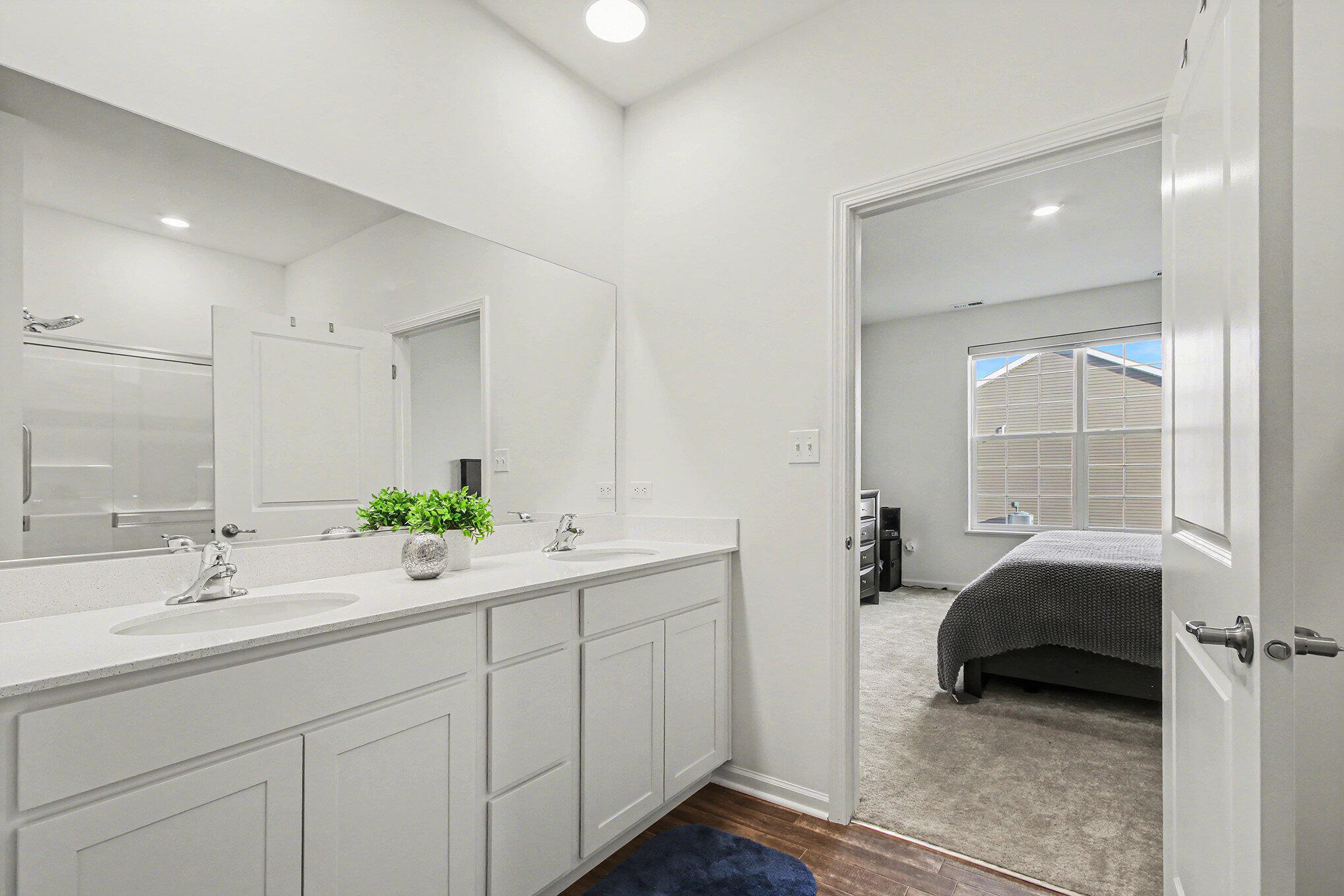 11649 Thomas Street Winfield, IN 46307 - Photo 9 of 15 a en suite bathroom with double sink and a mirror