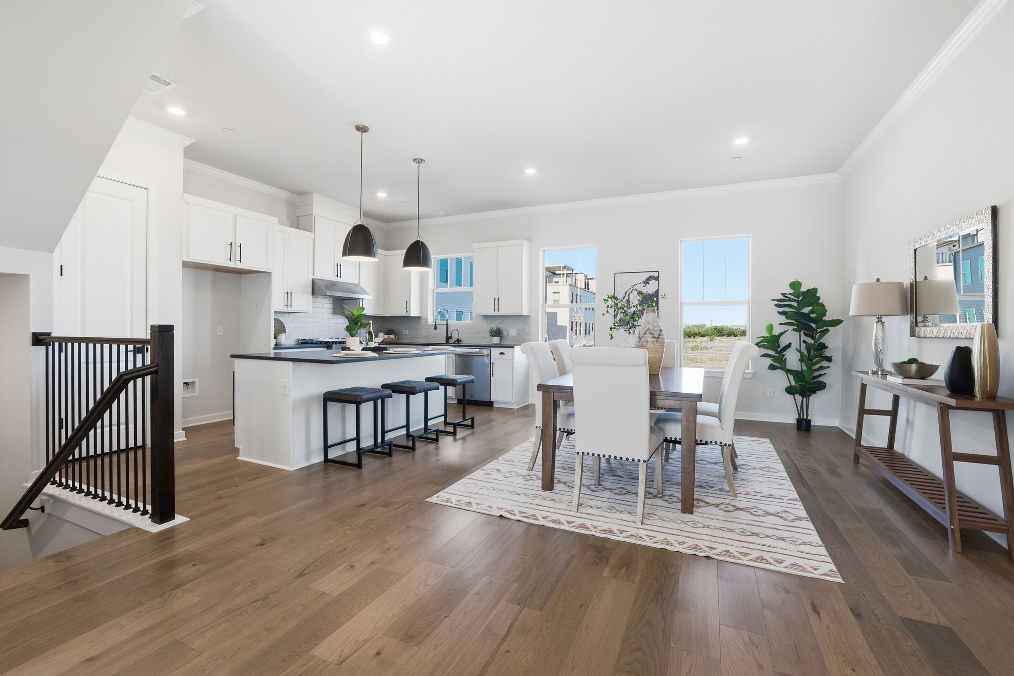 Dining room and Kitchen featuring high-end finishes, and recessed lighting