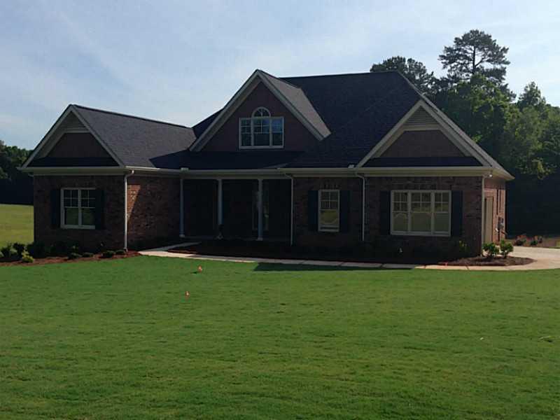 63 Old Collins Road Hoschton, GA 30548 - Photo 1 of 1 Exterior Front. Hurry! Come out and check out this home in Rivers Edge Phase II. Sod just in! Over 60 pallets! This home is ready for a buyer to come in and pick out appliances, hardwood stain & carpet!