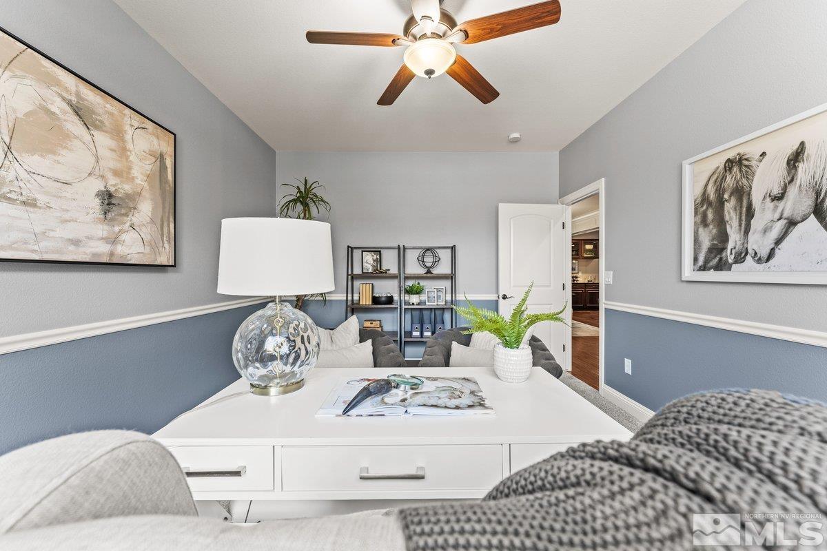 9860 Copenhagen Way Reno, NV 89521 - Photo 23 of 40 a bedroom with furniture and wooden floor