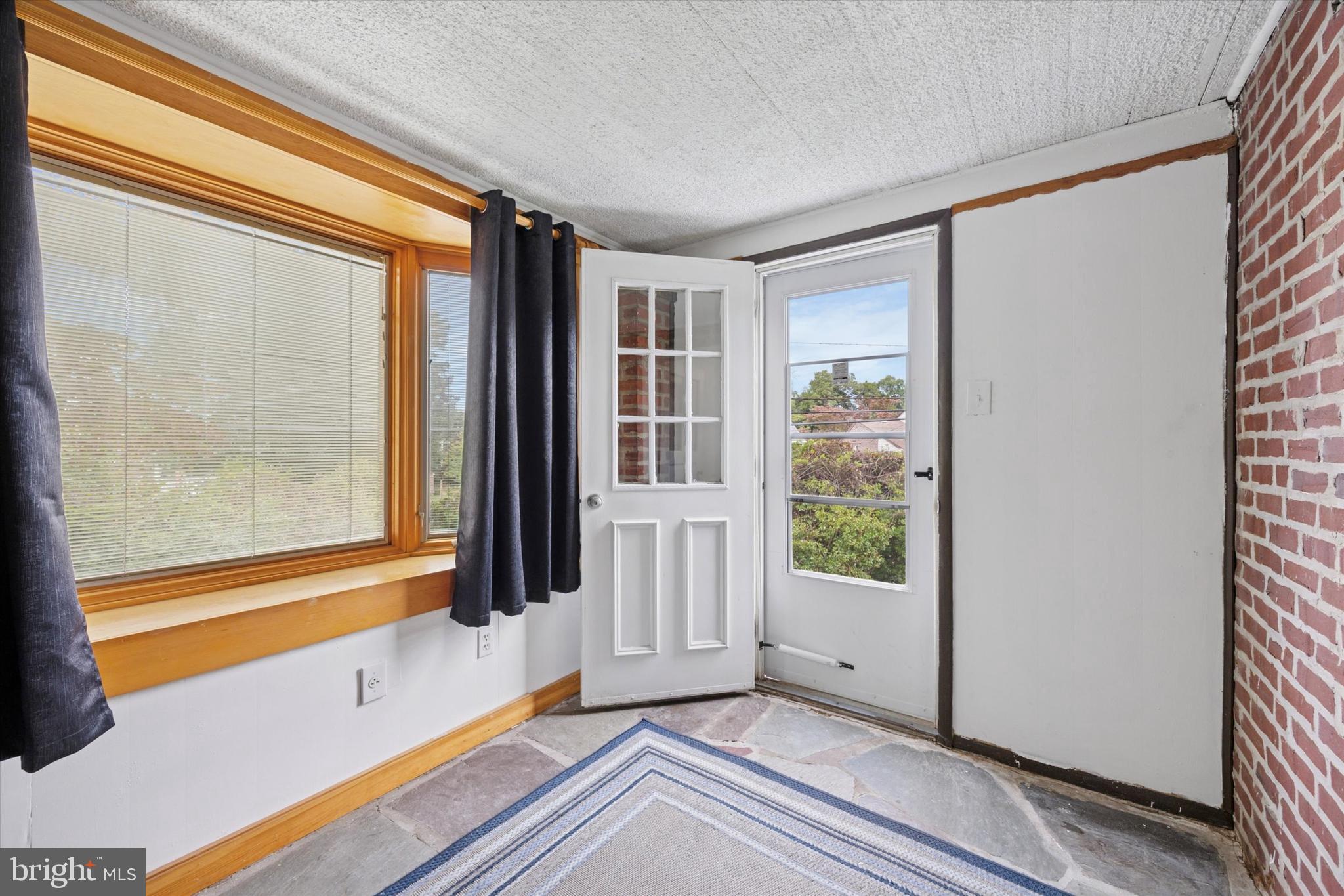 181 Friendship Road Drexel Hill, PA 19026 - Photo 13 of 24 a view of an empty room with windows