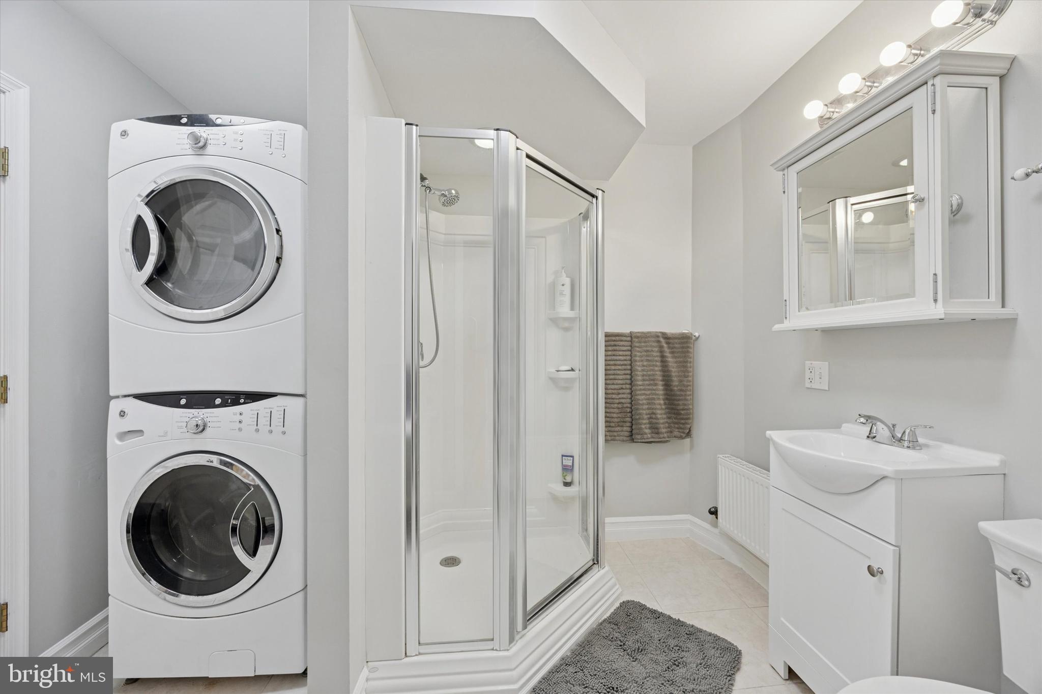 181 Friendship Road Drexel Hill, PA 19026 - Photo 14 of 24 a view of a hallway with washer and dryer