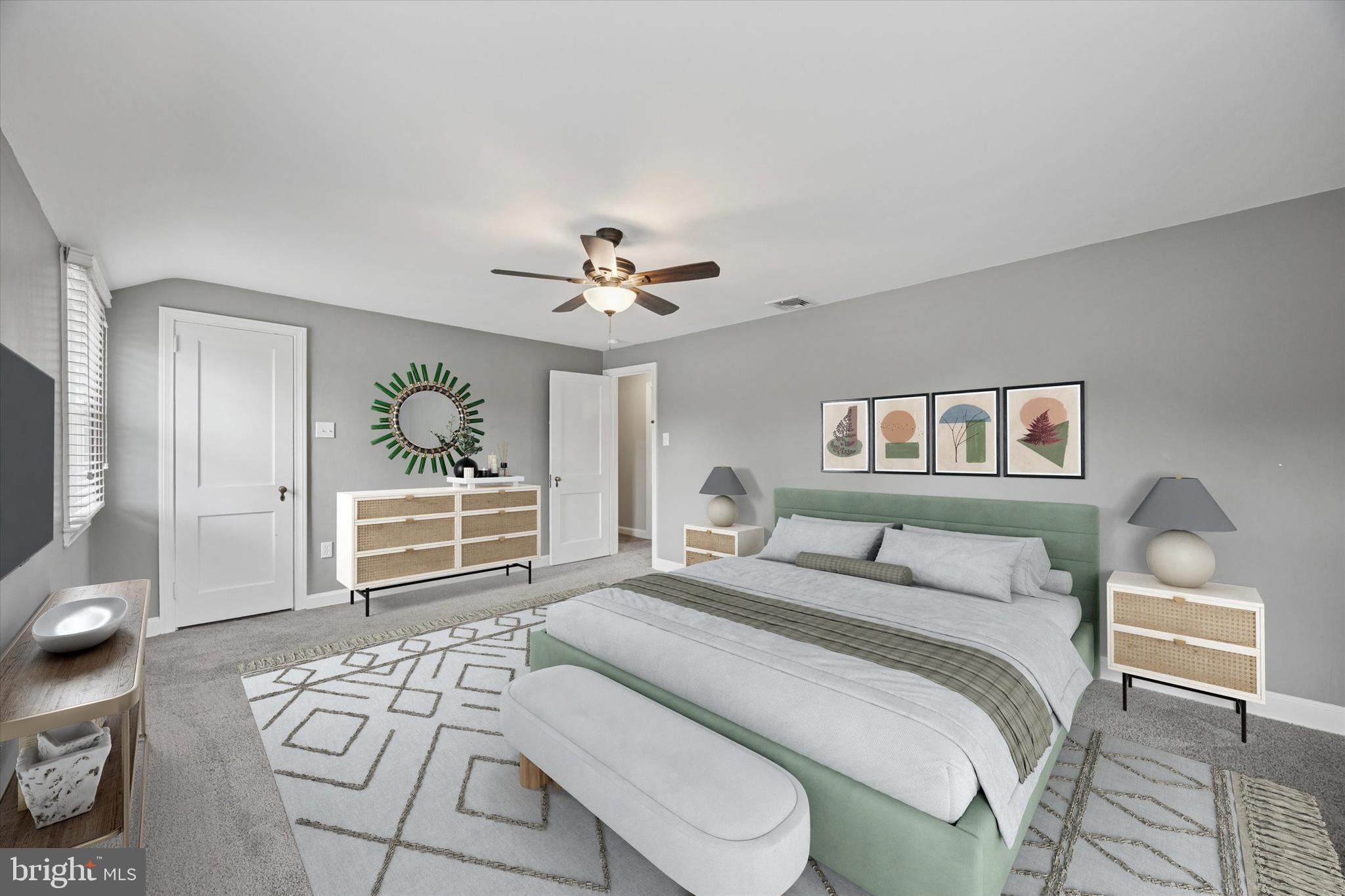 181 Friendship Road Drexel Hill, PA 19026 - Photo 16 of 24 a bedroom with a bed and a chandelier