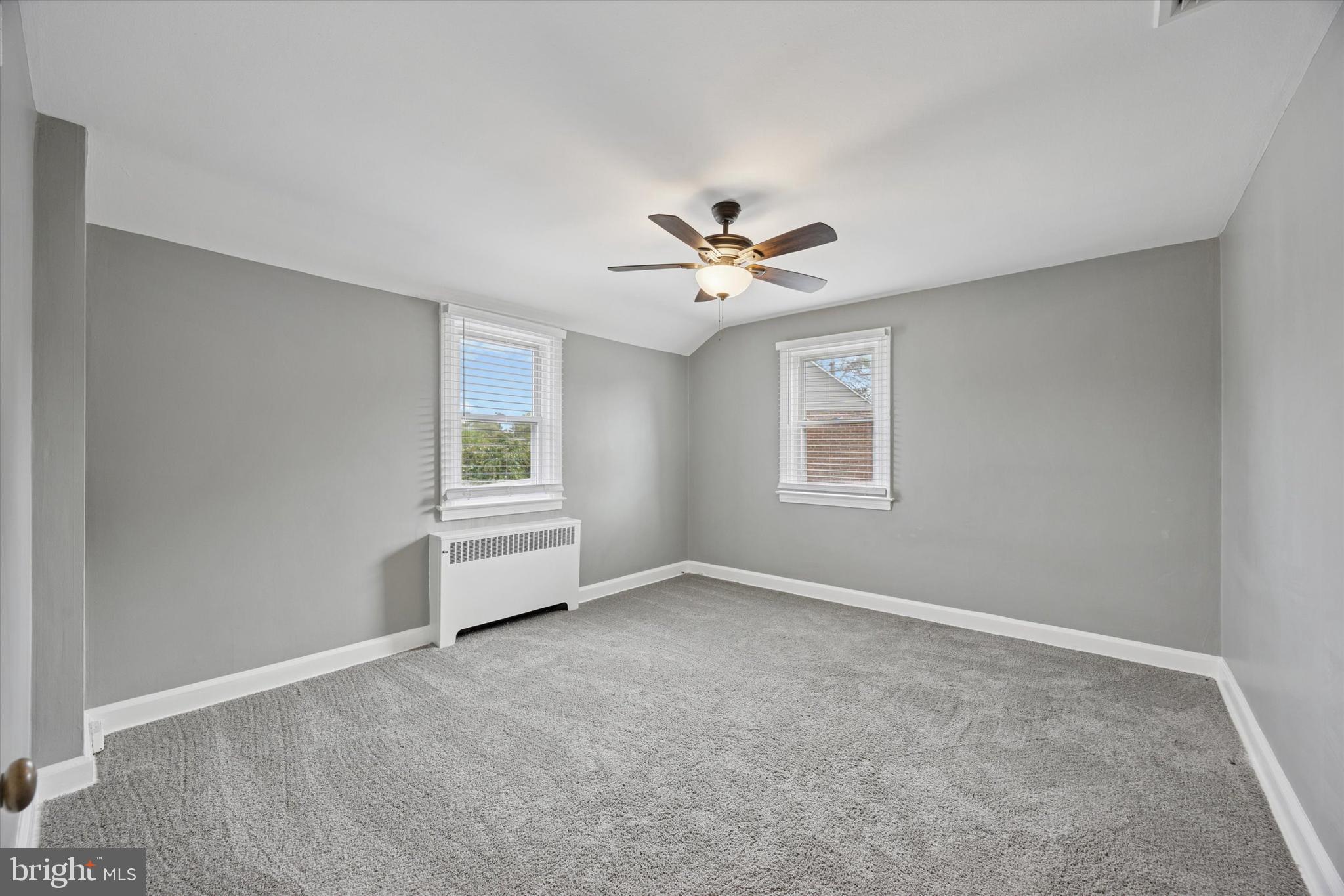 181 Friendship Road Drexel Hill, PA 19026 - Photo 17 of 24 a view of a livingroom with a ceiling fan and window