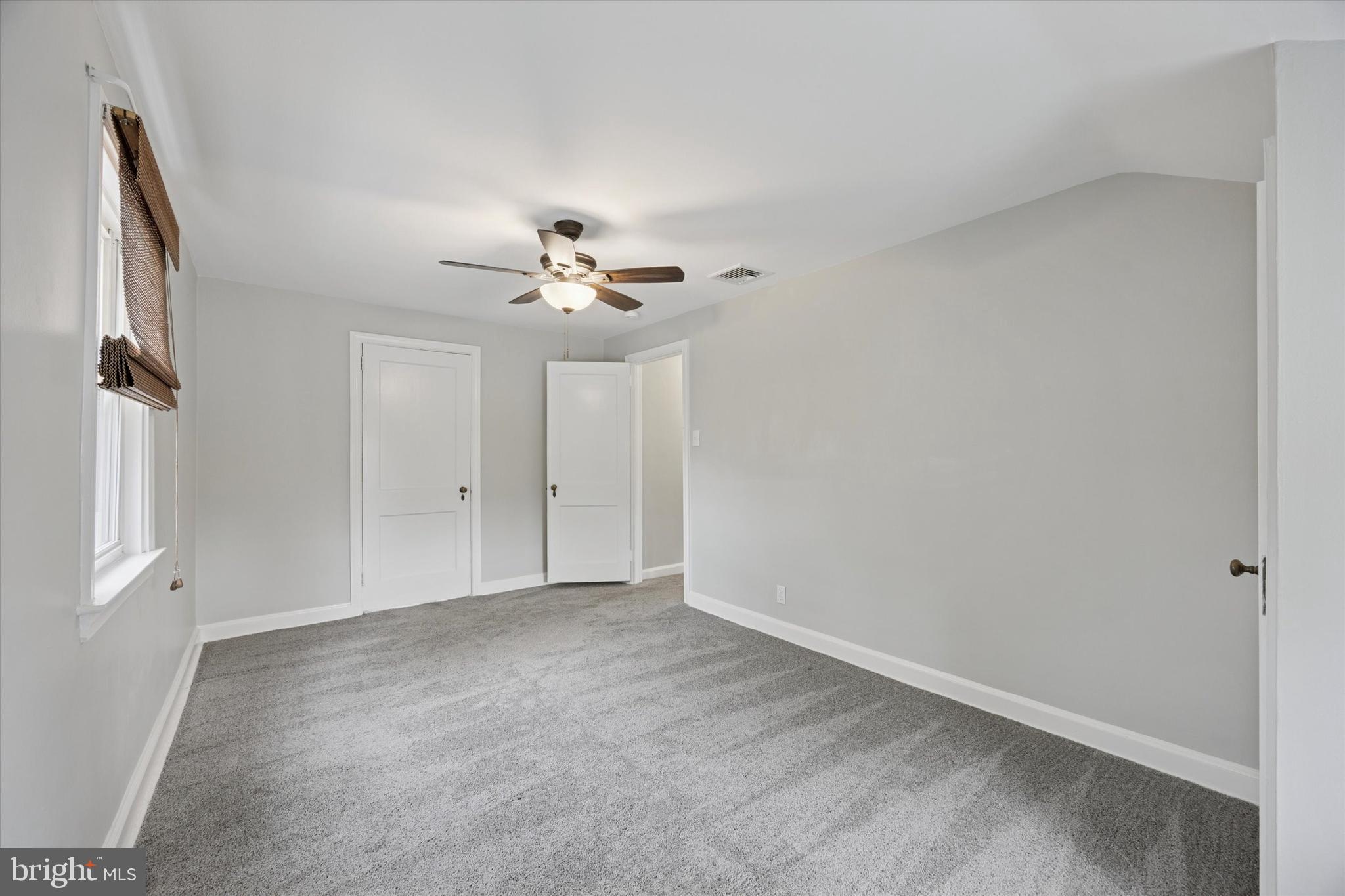 181 Friendship Road Drexel Hill, PA 19026 - Photo 21 of 24 a view of an empty room with a chandelier fan