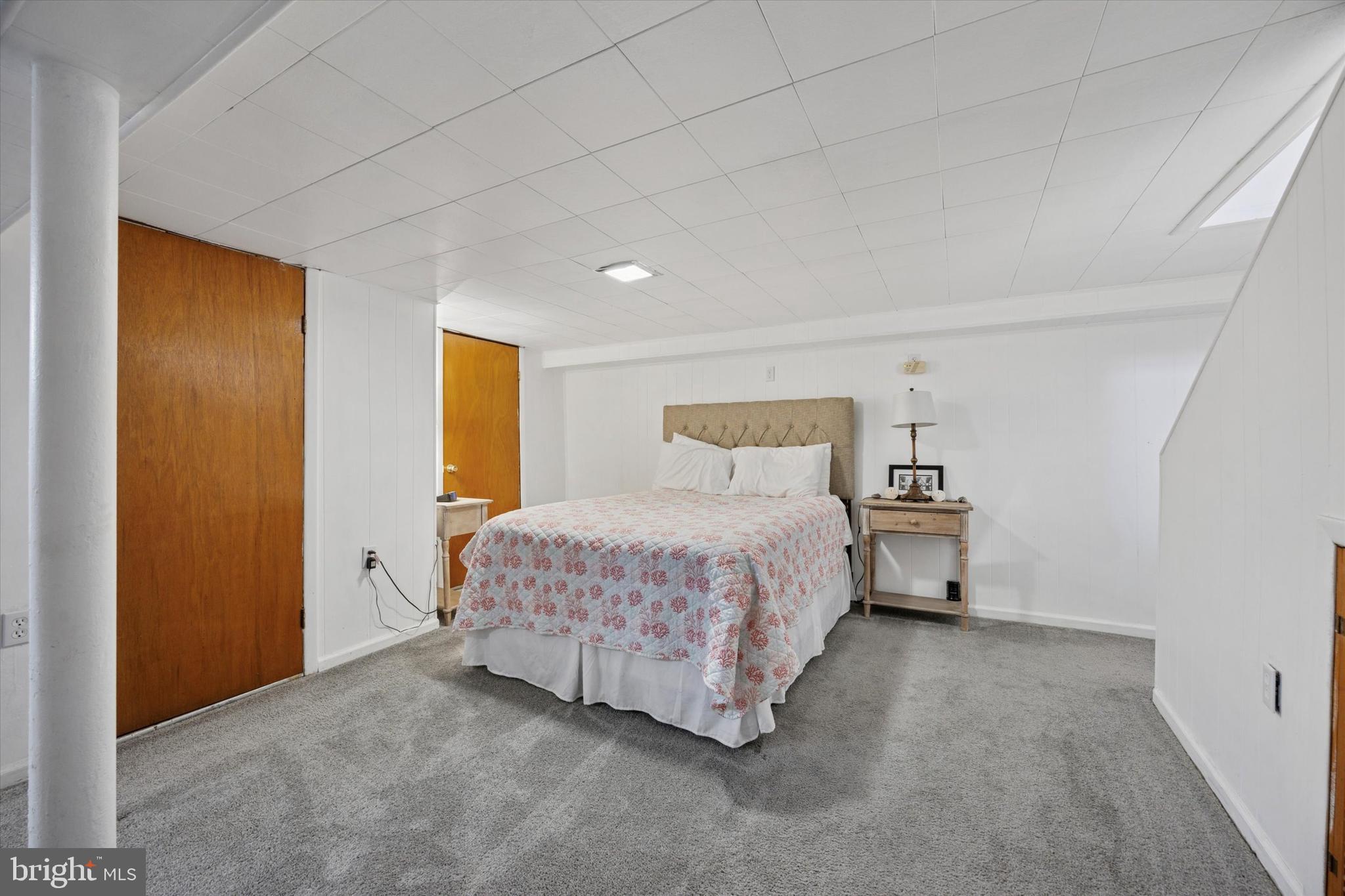 181 Friendship Road Drexel Hill, PA 19026 - Photo 23 of 24 a bedroom with a bed and a night stand