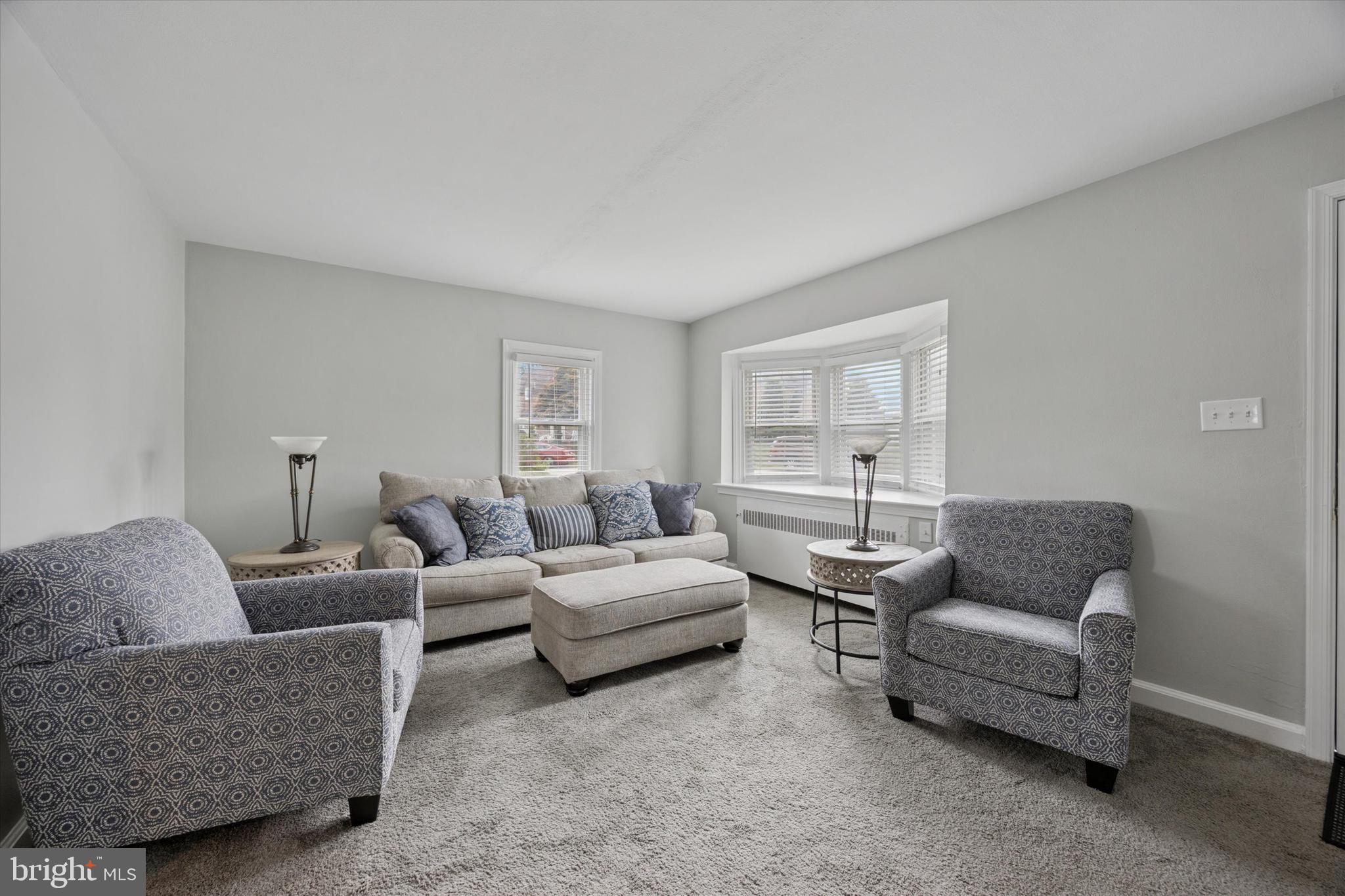 181 Friendship Road Drexel Hill, PA 19026 - Photo 5 of 24 a living room with furniture and a large window