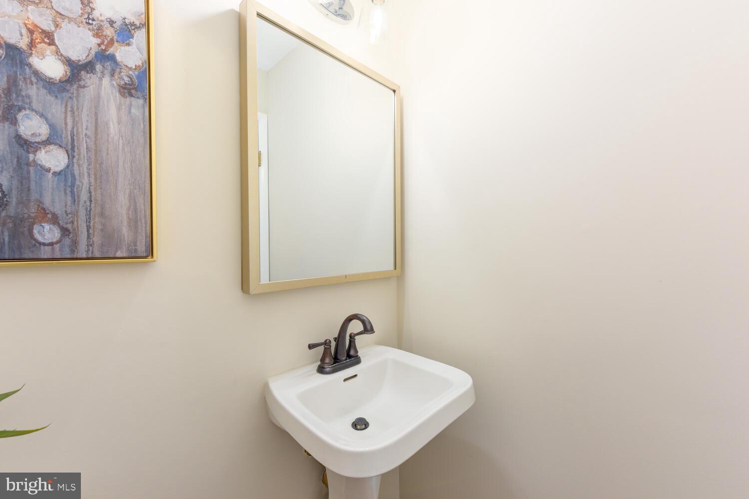 10902 Howland Drive Reston, VA 20191 - Photo 21 of 43 Main Level Powder Room