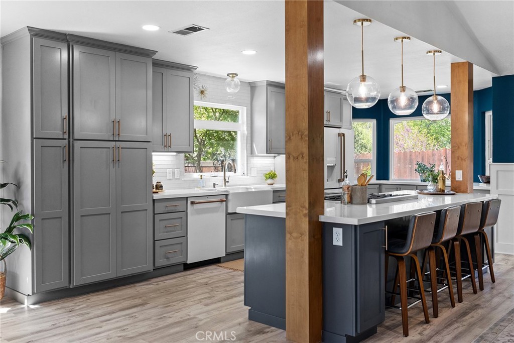2 Baroni Drive Chico, CA 95928 - Photo 2 of 63 a kitchen with stainless steel appliances granite countertop a sink a stove and a refrigerator