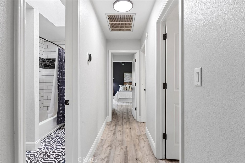 2 Baroni Drive Chico, CA 95928 - Photo 23 of 63 a view of a hallway with wooden floor and staircase