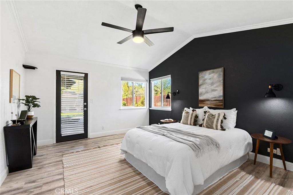 2 Baroni Drive Chico, CA 95928 - Photo 24 of 63 a bedroom with a bed and a chandelier