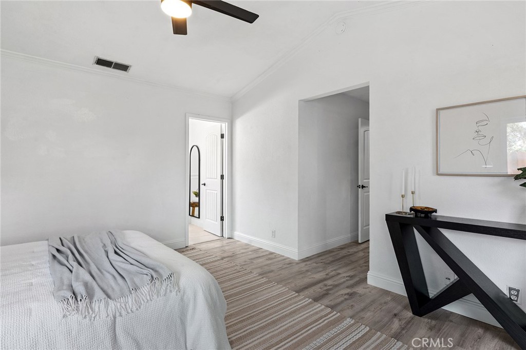 2 Baroni Drive Chico, CA 95928 - Photo 25 of 63 a bedroom with a bed and a ceiling fan