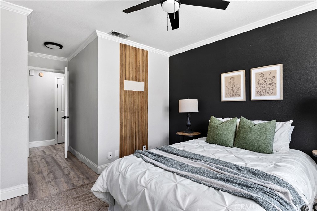 2 Baroni Drive Chico, CA 95928 - Photo 31 of 63 a bedroom with a bed and a painting on the wall