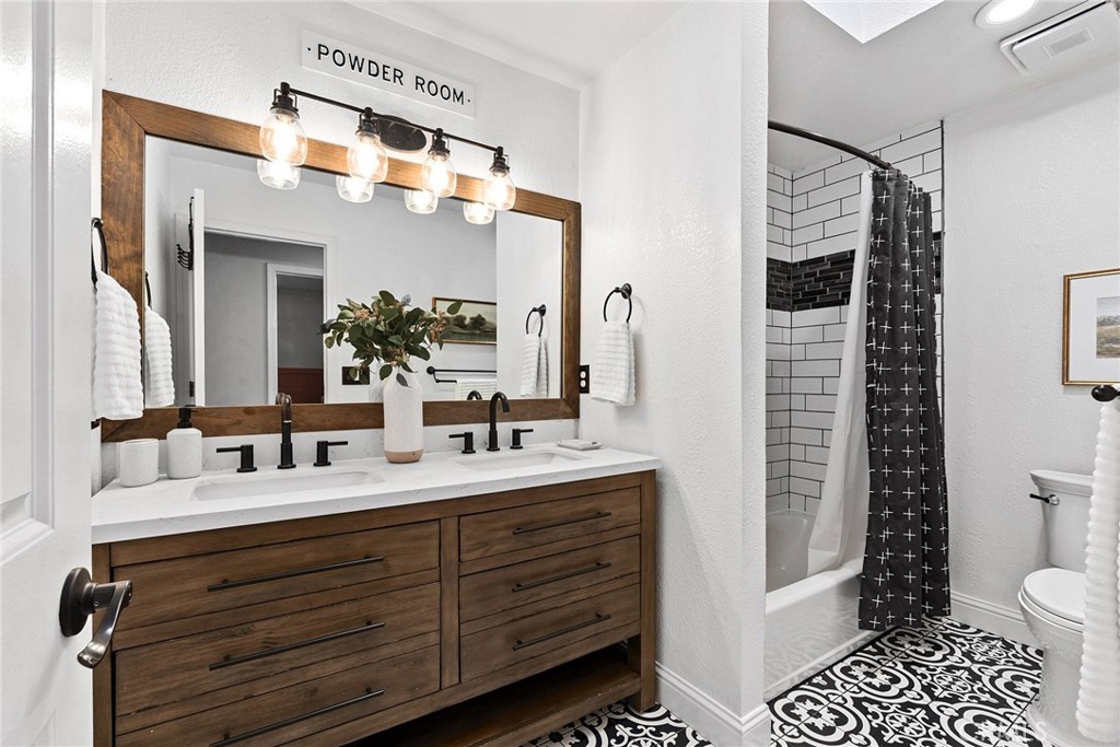 2 Baroni Drive Chico, CA 95928 - Photo 34 of 63 a bathroom with a sink a toilet and shower