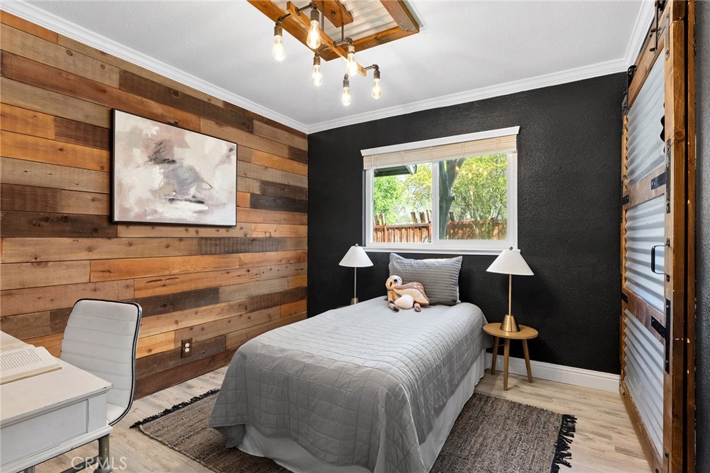 2 Baroni Drive Chico, CA 95928 - Photo 37 of 63 a bedroom with a large bed and a window