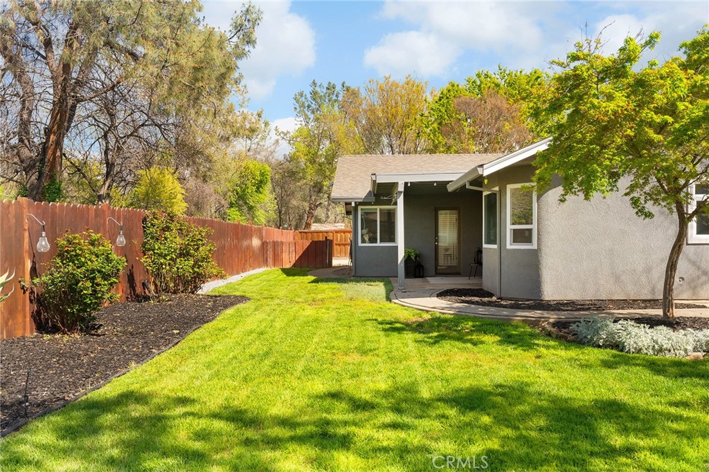 2 Baroni Drive Chico, CA 95928 - Photo 45 of 63 a view of a backyard with plants and large tree