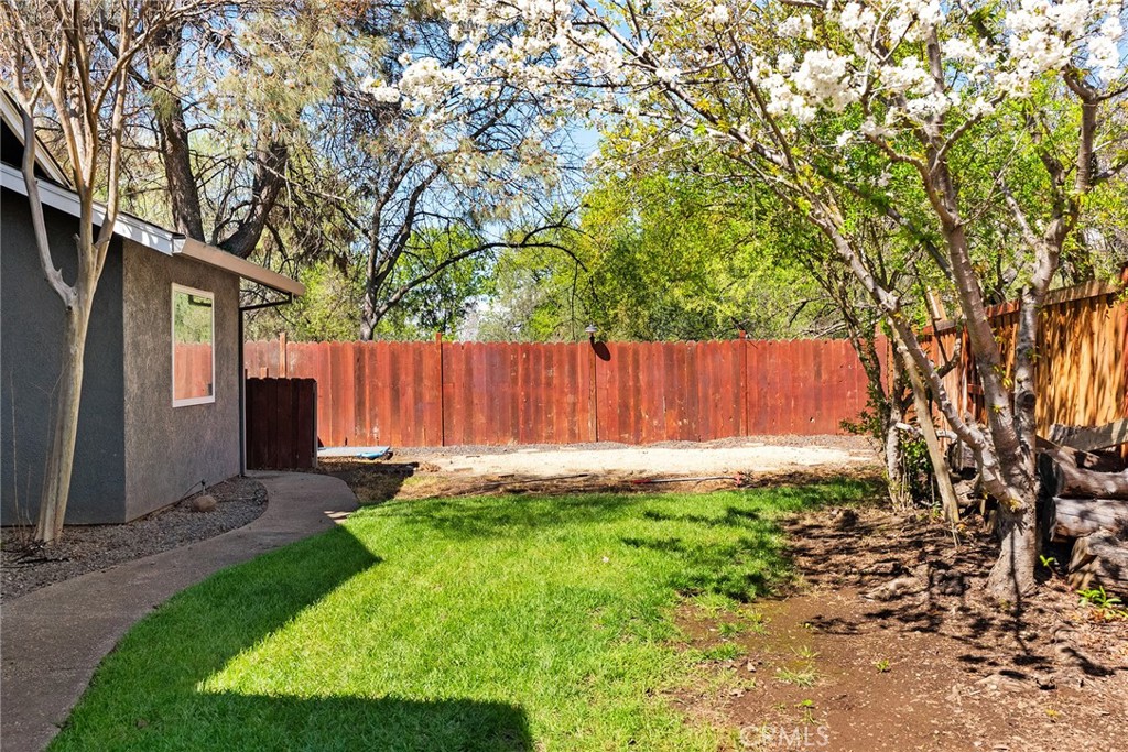 2 Baroni Drive Chico, CA 95928 - Photo 50 of 63 a view of a backyard with large trees