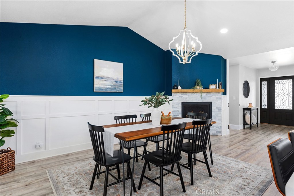 2 Baroni Drive Chico, CA 95928 - Photo 8 of 63 a view of a dining room with furniture a chandelier and wooden floor