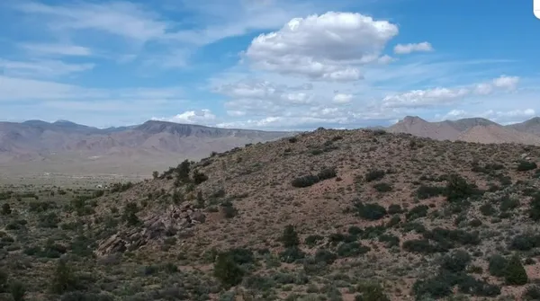 a view of mountains and valleys