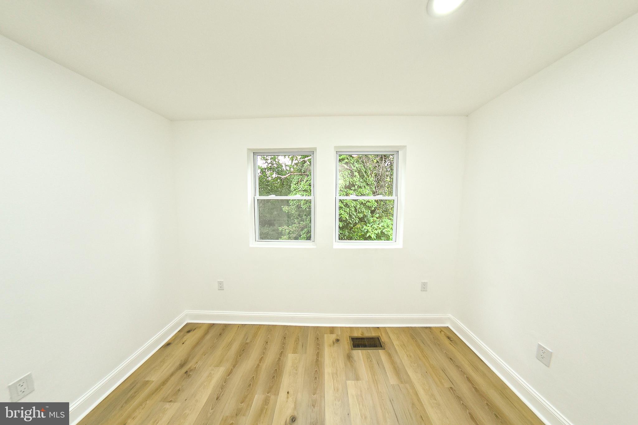3704 Suitland Road Southeast Washington, DC 20020 - Photo 29 of 70 an empty room with a window