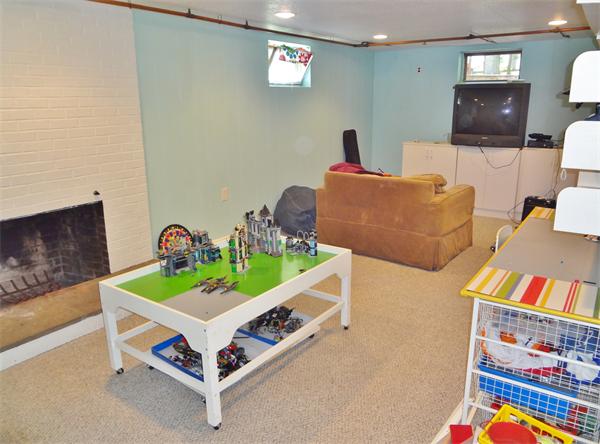 27 Birch Road Natick, MA 01760 - Photo 11 of 16 a room with furniture and a flat screen tv
