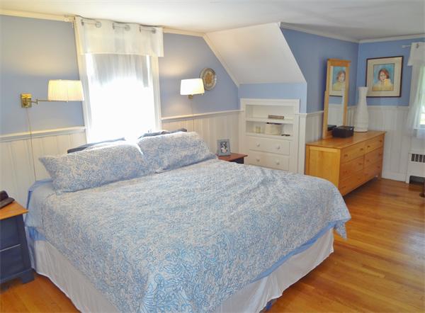 27 Birch Road Natick, MA 01760 - Photo 8 of 16 a bedroom with a bed and window