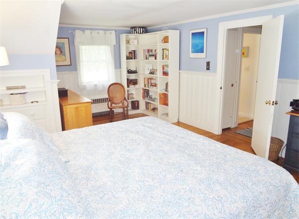 27 Birch Road Natick, MA 01760 - Photo 9 of 16 a bedroom with a bed and a cabinets