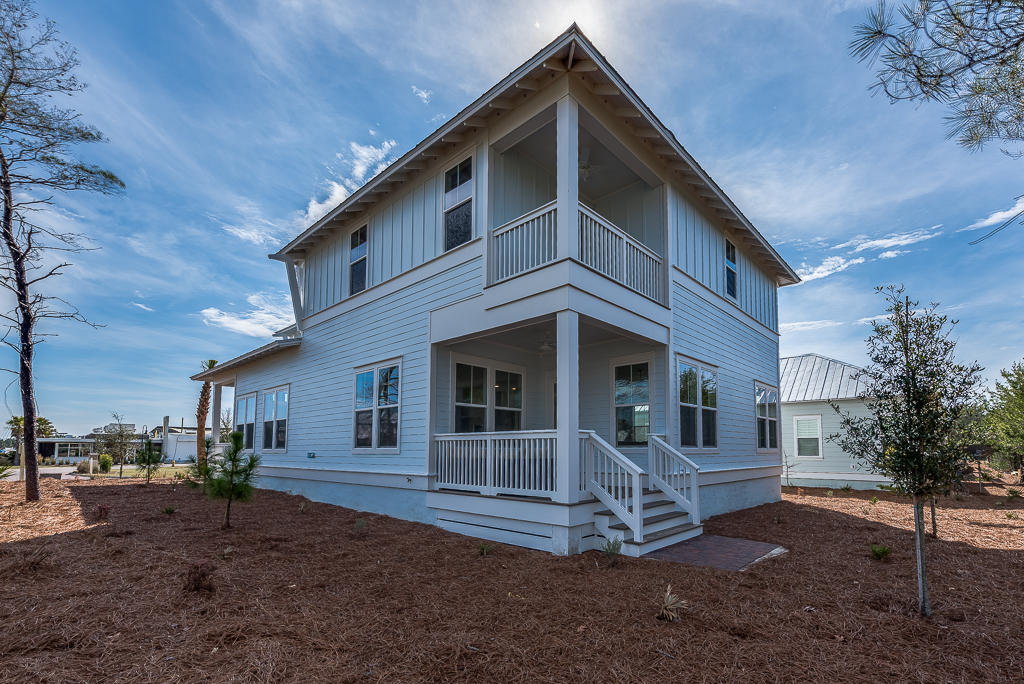 20 Prominence Square Inlet Beach Inlet Beach, FL 32461 - Photo 3 of 53 a front view of a house with a yard