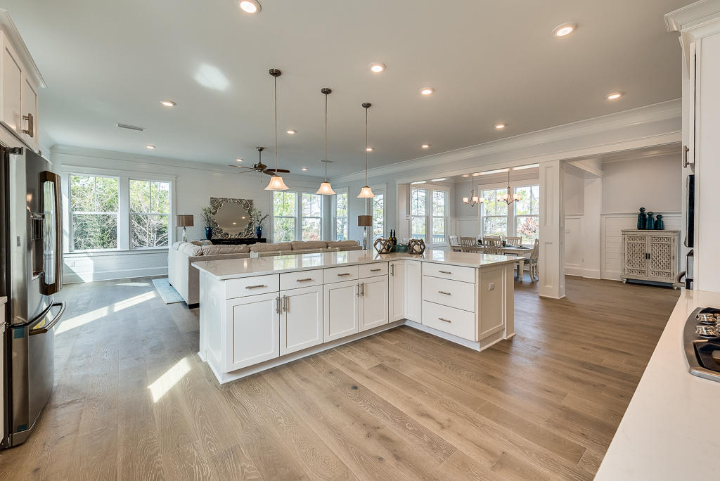 20 Prominence Square Inlet Beach Inlet Beach, FL 32461 - Photo 24 of 53 a large kitchen with stainless steel appliances kitchen island a large counter top and a stove top oven