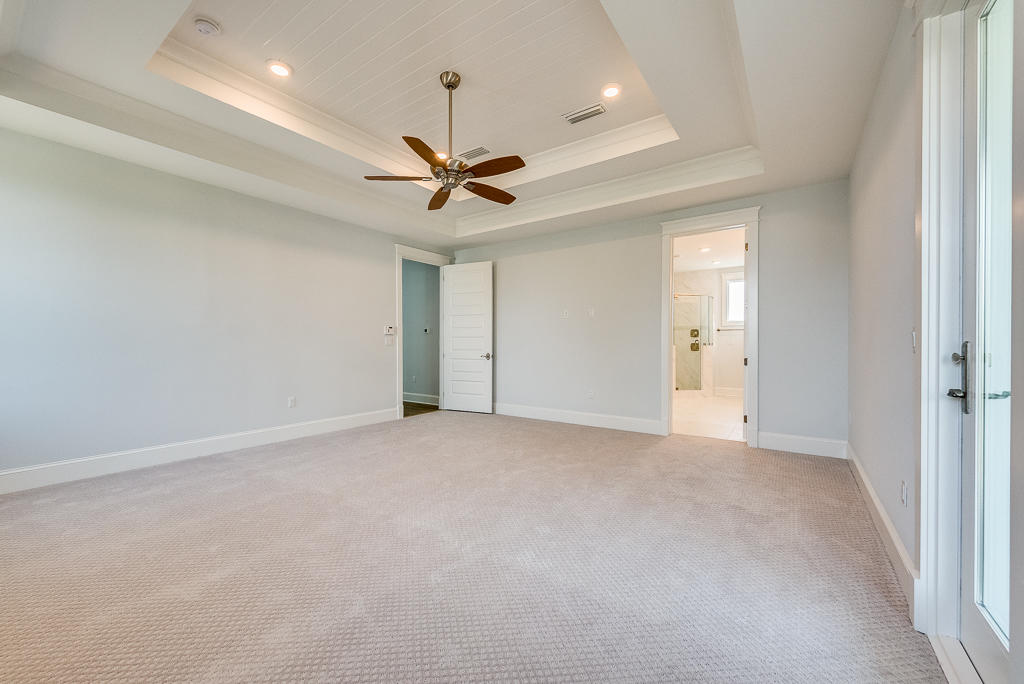 20 Prominence Square Inlet Beach Inlet Beach, FL 32461 - Photo 37 of 53 an empty room with a ceiling fan and a ceiling fan