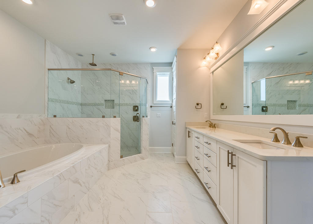 20 Prominence Square Inlet Beach Inlet Beach, FL 32461 - Photo 38 of 53 a spacious bathroom with a tub sink shower and mirror