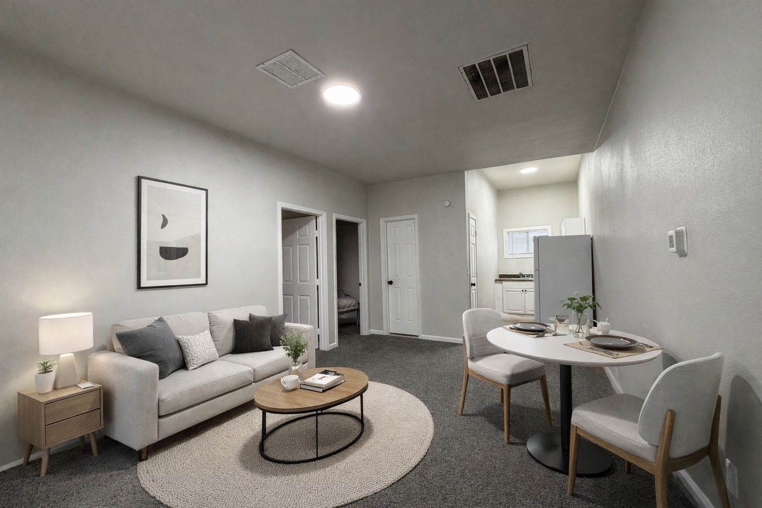 a living room with furniture and a table