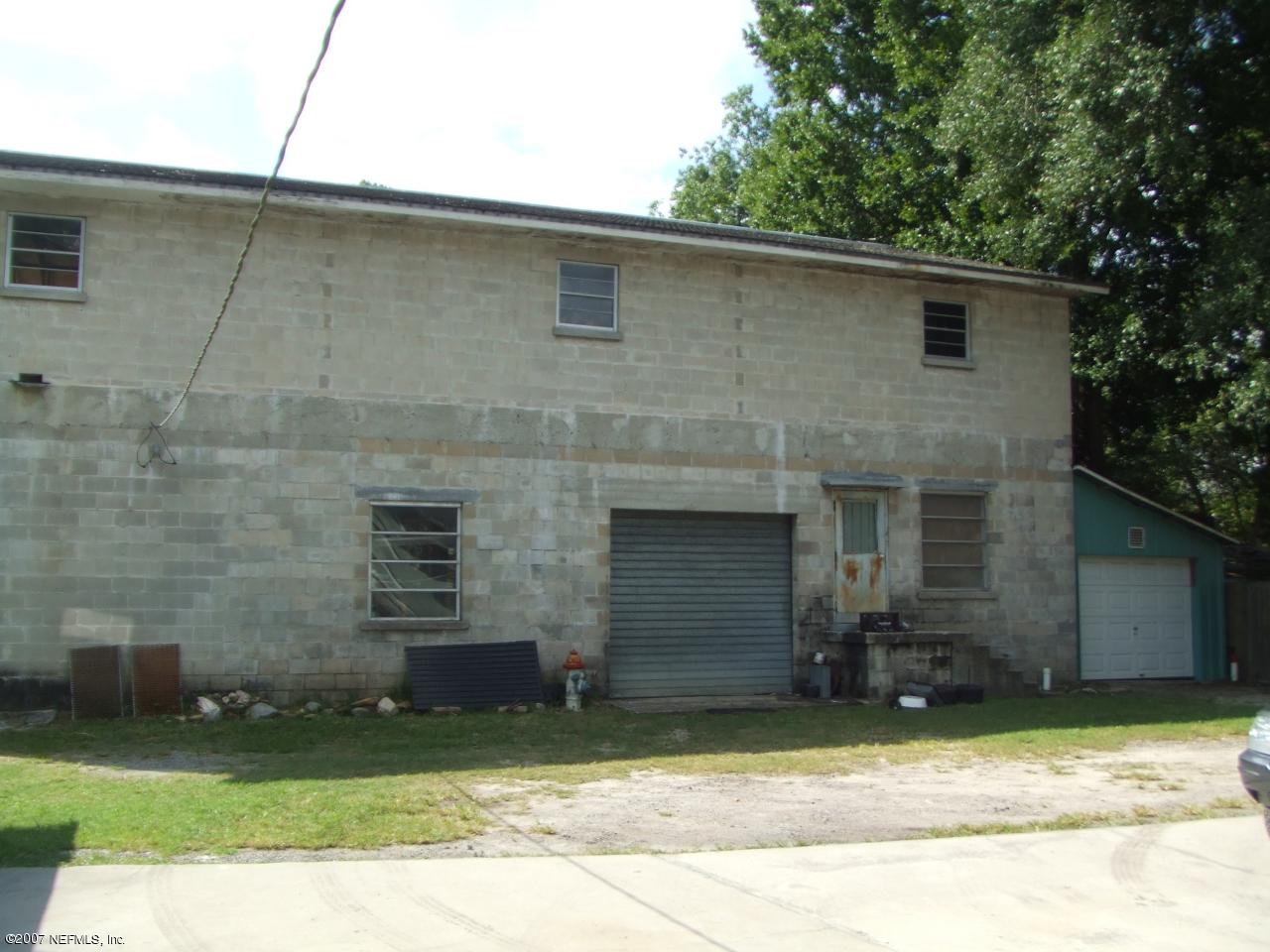 0 Comanche Street Jacksonville, FL 32205 - Photo 3 of 5 a brick house with a large window