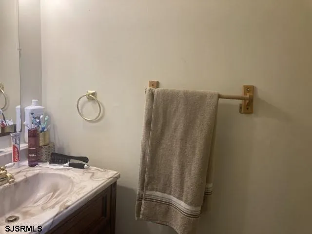 a view of balcony with two chairs and a table