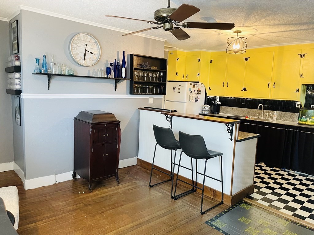 61 Fenner Street Fall River, MA 02724 - Photo 16 of 23 a view of a kitchen with a sink and cabinets