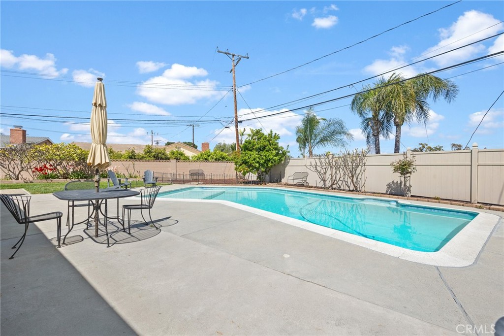 14895 Fairvilla Drive La Mirada, CA 90638 - Photo 21 of 31 a view of a patio with a table and chairs
